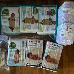 Lot of unopened diapers (newborn and size 1)